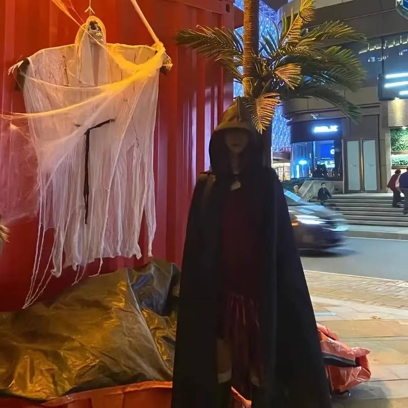 Hooded Horror Halloween Costumes | Some Decorations Are Just Décor — This One Becomes Part of Your Tradition